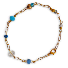 Blue Crystal Gold Tone Linked Bracelet with stainless steel chain and blue crystal beads.