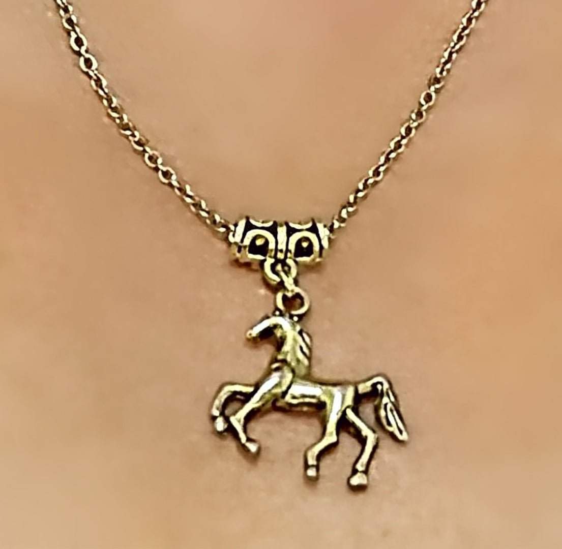 Horse charm antique gold necklace on stainless steel chain.