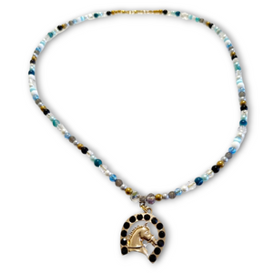 Blue Agate Crystal Horseshoe Necklace with beaded design and gold plated horseshoe pendant.