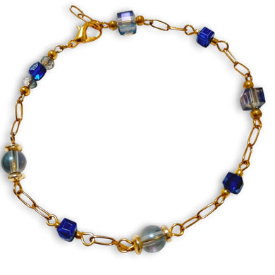 Blue Cube Round Crystal Gold Chain Bracelet with blue cube and round crystals, beaded on a gold tone chain.