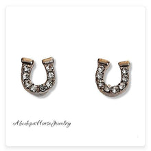 Crystal Horseshoe Studs with tiny crystal stones, silver design, and comfort backings.