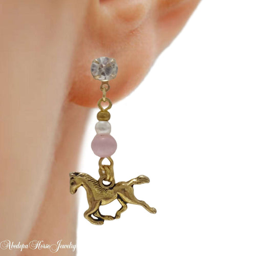 Diamonte Catseye Horse Earrings with gold studs, pink catseye bead, white pearl, and horse charm.