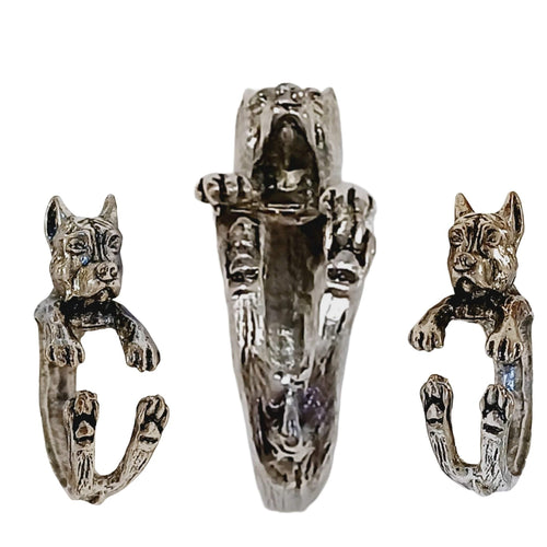 Dog adjustable antique silver ring with paw details and dog design.