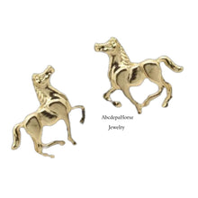 Gold Tone Horses StudsSALE****Great pair of horse studs these are fashion earrings 
so can be worn with anything that are a great gift or even to keep
for yourself 
comes with gift bagGold Tone Horse StudsAHJ madeAbcdepaHorseJewelryGold Tone Horses Studs