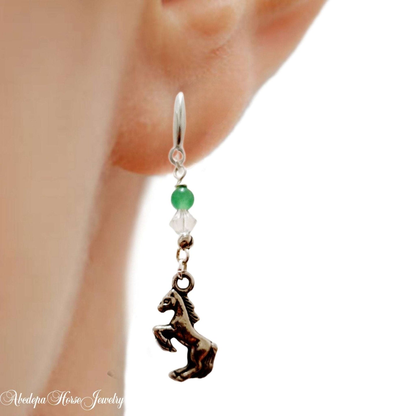 Green Aventurine Crystal Horse Earrings with stainless steel and silver detailing.