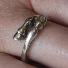 Hooves Open Size Ring in silver metal on finger with horse hoof design.