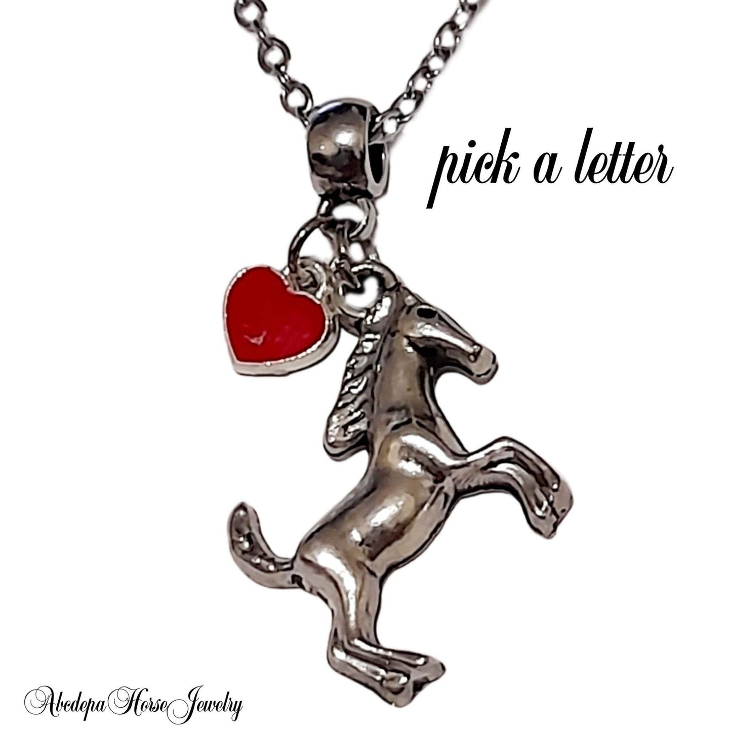 Horse Charm Loveheart Necklace with silver horse and heart pendants on stainless steel chain.