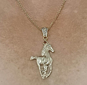 Yellow gold-plated horse pendant galloping necklace on stainless steel chain.