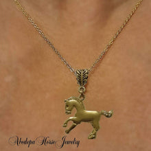 Handcrafted gold horse pendant necklace with plated chain, 4cm x 3cm pendant, 60cm length.