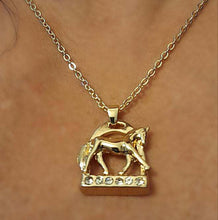 Horse Stirrup with Horse NecklaceHorse Stirrup with Horse Necklace This elegant Horse Stirrup Necklace features a stunning horse doing an extending trot on the base of the stirrup. Adorned with sparHorse Stirrup NecklaceAHJewelryAbcdepaHorseJewelryHorse Stirrup