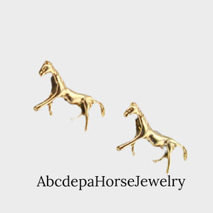 Horse trotting gold stud earrings with rubber and metal backs, 1cm size, gift-ready.