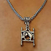 Horsehead Bit Charm Necklace on stainless steel chain.