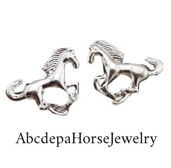 Horses Galloping Studs[Trusta is the name of these Galloping Horse Stud Earrings with the horses
mane and tail flicking in the air Silver Toned so if taken care of will keep
the nice shinsilver studs horsesAHJ SupplierAbcdepaHorseJewelryHorses Galloping Studs