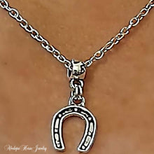 Horseshoe Charm Pendant - on silver chain necklace.