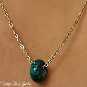 Malachite Donut Necklace on gold stainless steel chain.