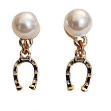 Pearl Horseshoe Studs with gold-plated horseshoe.