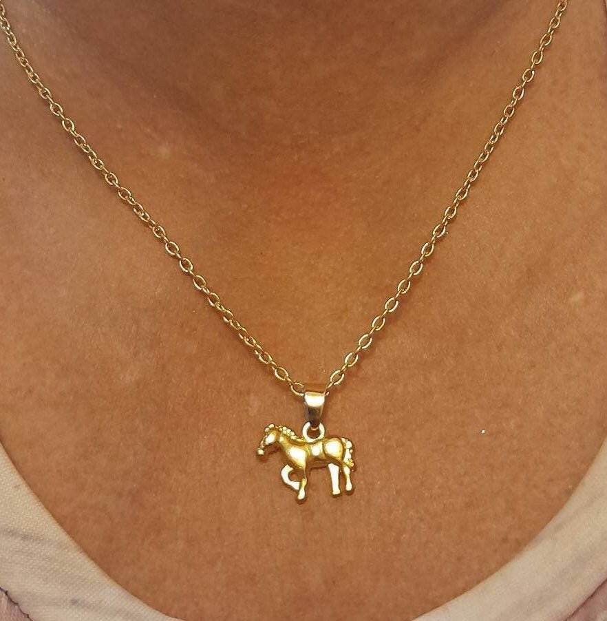 Gold Standing Pony Necklace with gold-plated pony pendant on a stainless steel chain.