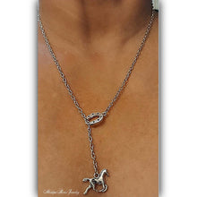 Silver equestrian pull-thru horse necklace with horseshoe charm.