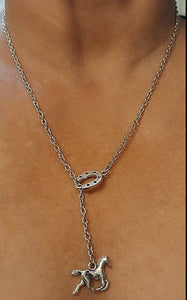 Silver pull-thru horse necklace with horseshoe and horse pendant design.