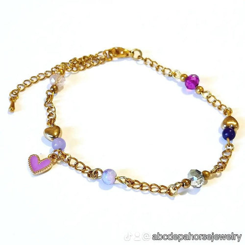 Purple Loveheart Charm Gold Bracelet with gemstone beads and heart charm.