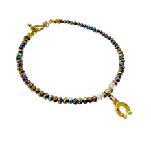 Rainbow Crystal Rondels Gold Horseshoe Bracelet with antique gold elements and colorful rondels.