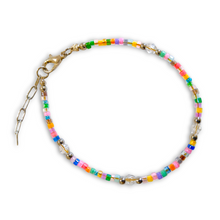 Colorful seedbead bracelet with silver stainless steel beads and lobster claw clasp.