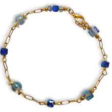 Blue Cube Round Crystal Gold Chain Bracelet with blue and clear beads.