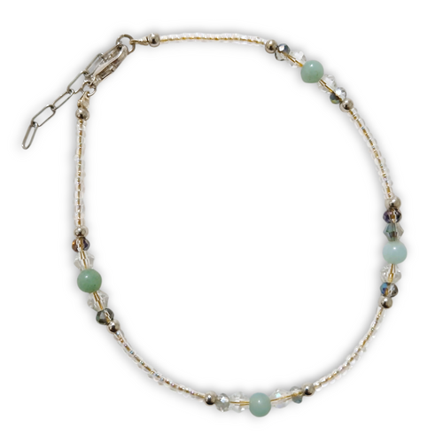 Amonizite Anklet with green-blue gemstones, purple jade, crystal rondels, and gold stainless steel beads.