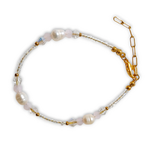 Pearl Child Bracelet with real pearls, crystal beads, and gold stainless steel accents.