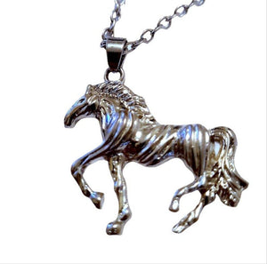 Silver Horse Cantering Pendant Necklace with customizable birthstone option.