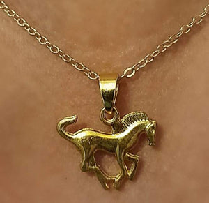 Small Size Gold Gee Gee Pendant Necklace with antique horse design on gold chain.