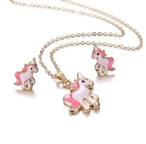 Unicorn jewelry set with gold plated chain, pink and white enamel unicorn pendants, and matching earrings.